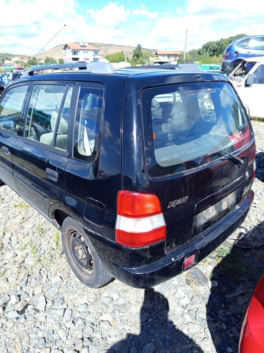 Мазда Демио бензин