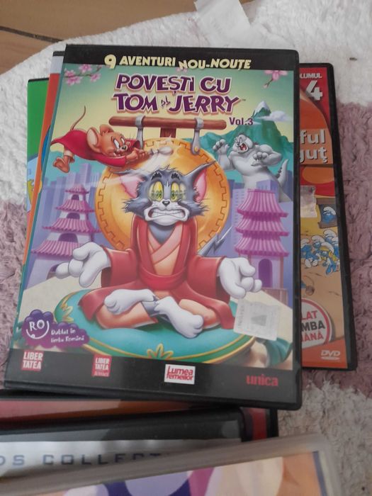 Cd-uri animate, tom si jery, strumfi, kemy curiosul si cu printese