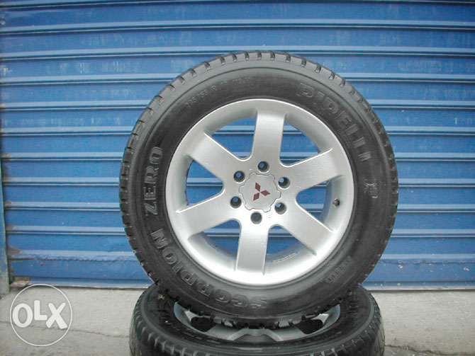 4 бр оригинални джанти 6x18" Mitsubishi с гуми Pirelli 285/55/18