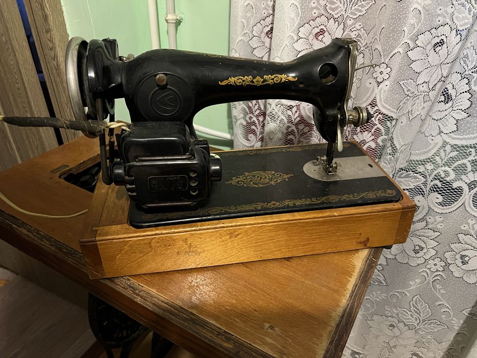 Vind Mașină de cusut Sunger.