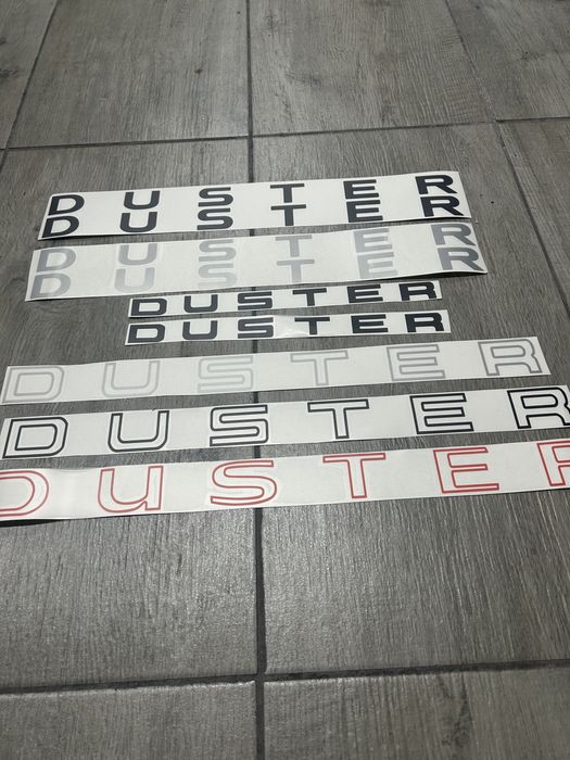 Scris bări longitudinale si capota Duster