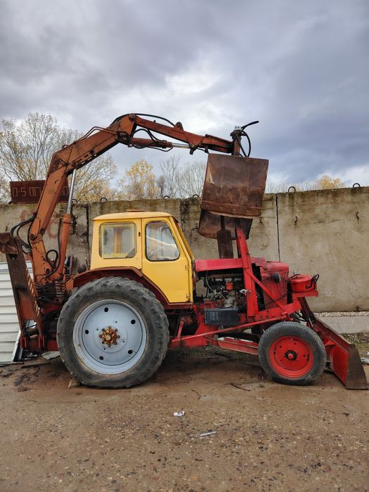 ЮМЗ с грайферен устройство