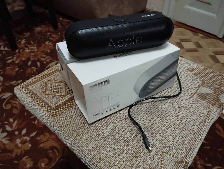 Портативный музыкальный плеер Apple