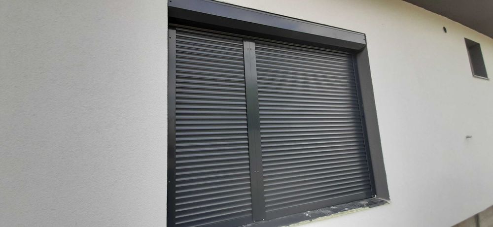 RULOURI Aluminiu si Usi de garaj rezidentiale SECTIONALE