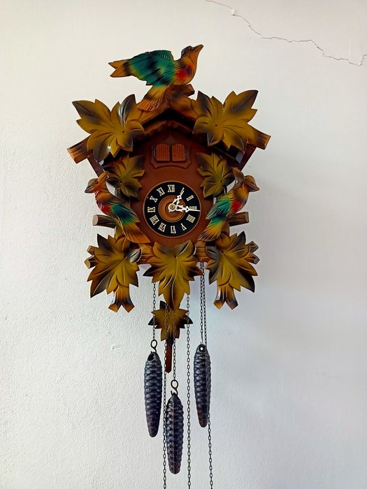 Ceas mecanic cu cuc și tambur muzical