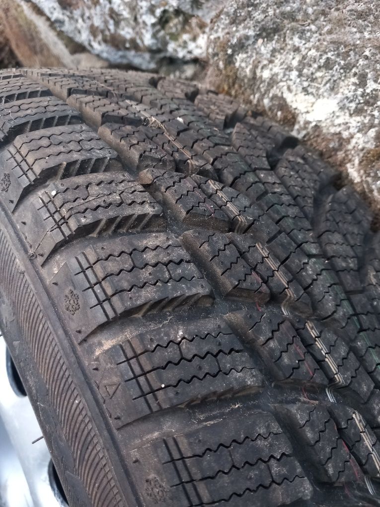 Джанти с гуми зимни 4х100 185/65 R14 Фолксваген Опел Volkswagen Opel