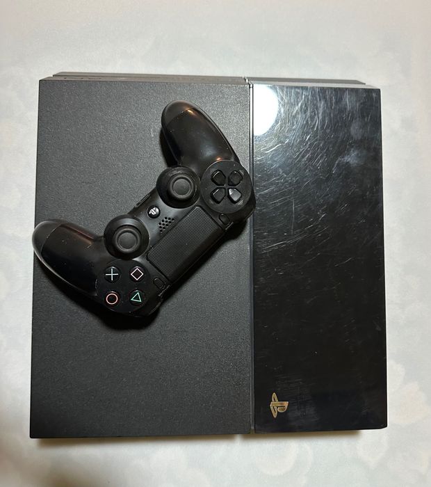 PlayStation 4 + șapte jocuri