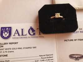 Inel aur alb 14 kt cu diamant natural  de 0.63 ct