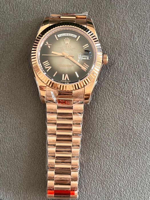 Rolex Day-Date roz gold
