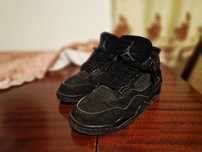 Jordan 4 black cat