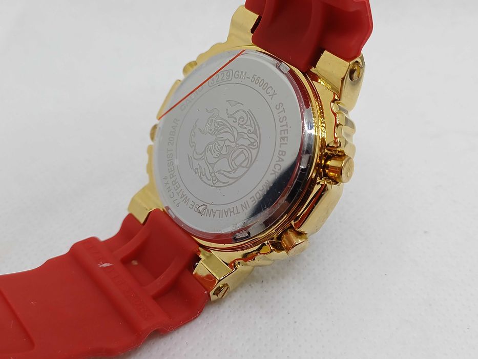 Ceas Casio g shock gm 5600cx Metal Gold-red Nou,Garantie 2 ANI