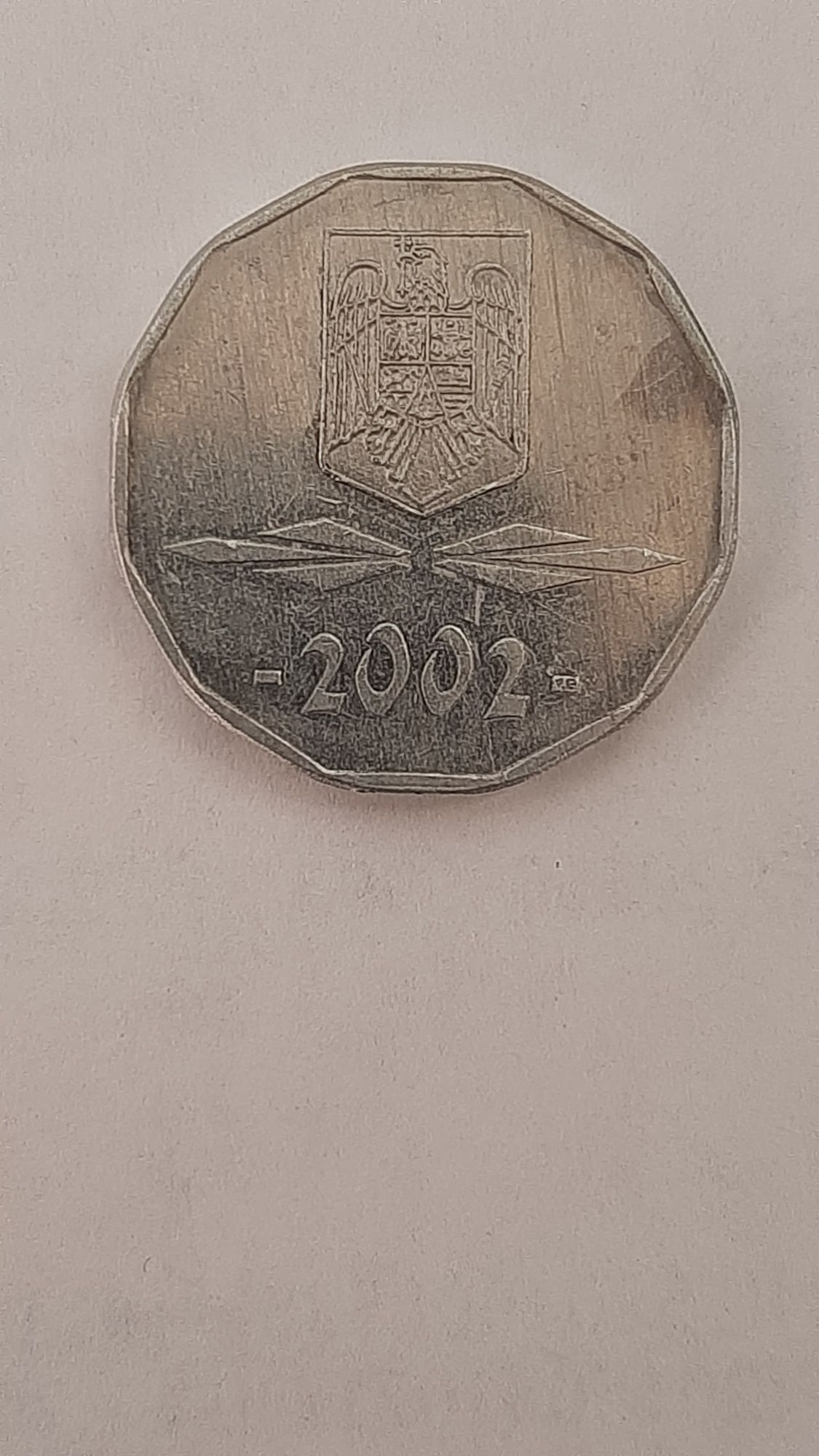 Vind moneda 5000.lei.an. 2002