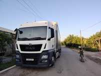 MAN TGX 18.460 EURO 6 + SCHMITZ прицеп Сотилади