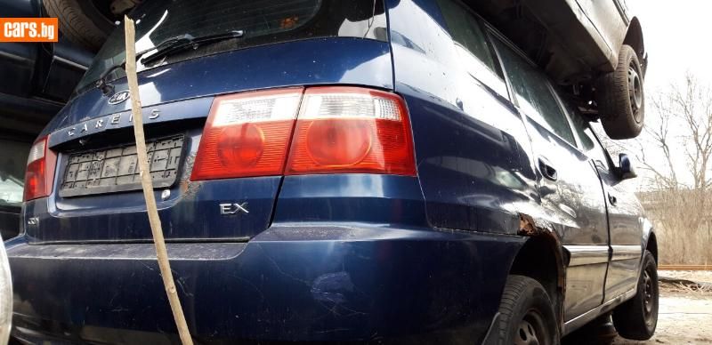 Киа каренс 2.0crdi