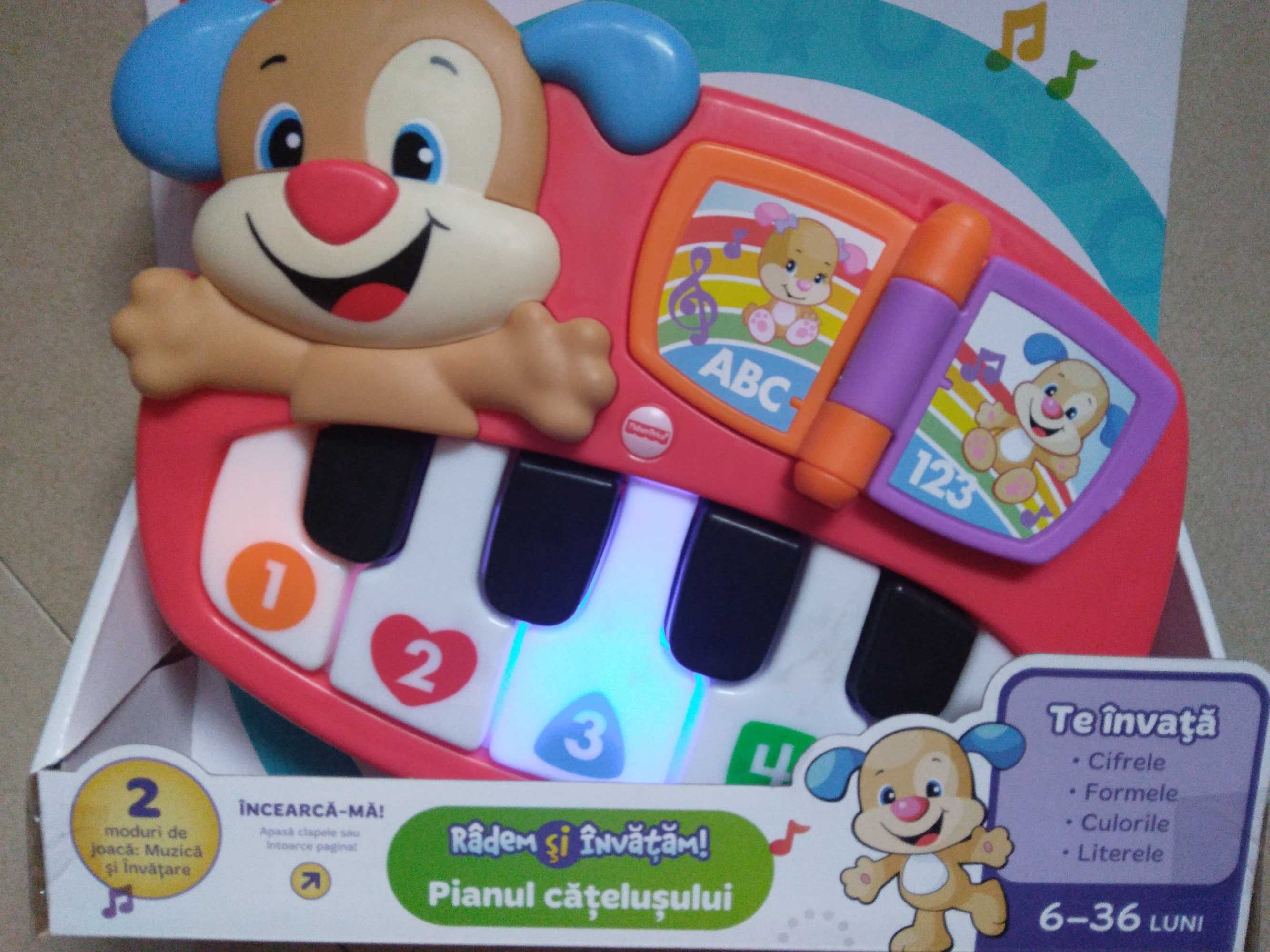 Catelusul cu pian Fisher Price, lumini si sunete,6-36luni, nou,sigilat