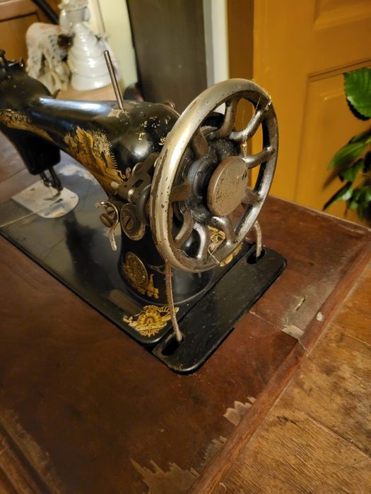 Masina de cusut Singer