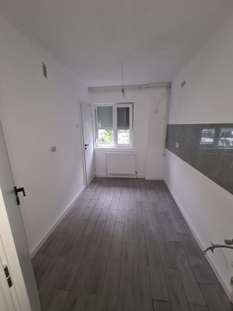 Apartament doua camere,parter inalt