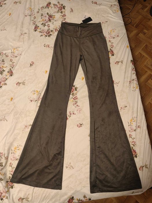 Pantaloni/colanti evazati