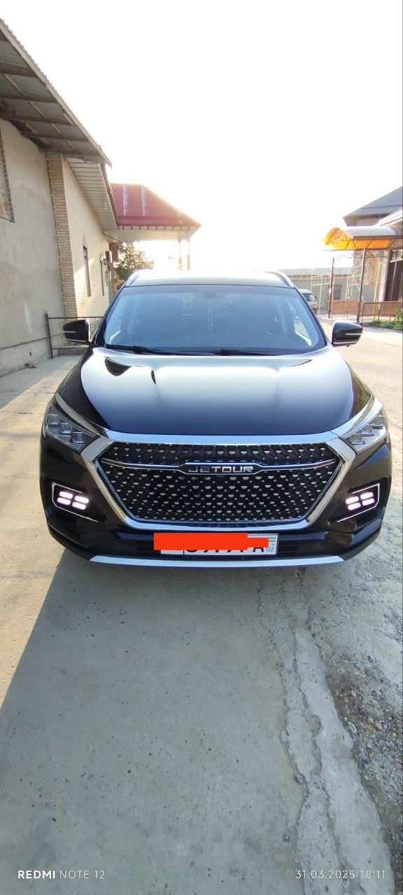 Jetour X95 full чёрного цвета