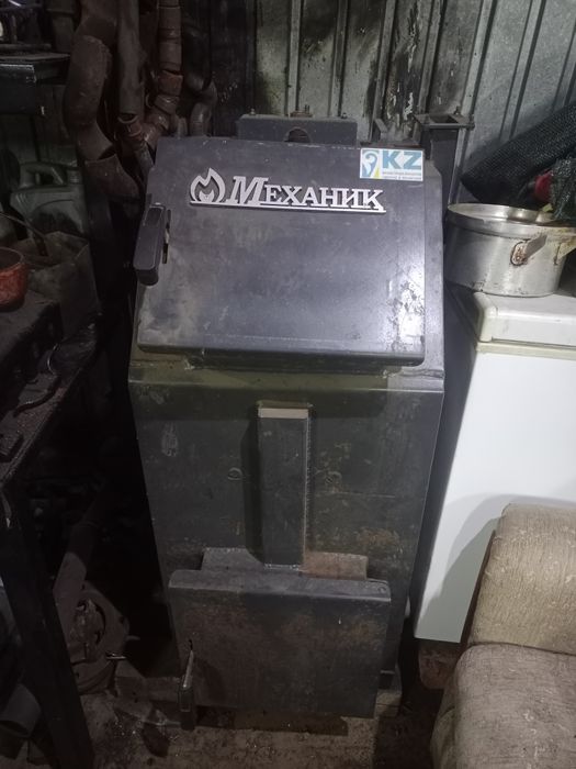 Котёл длительного горения Механик
