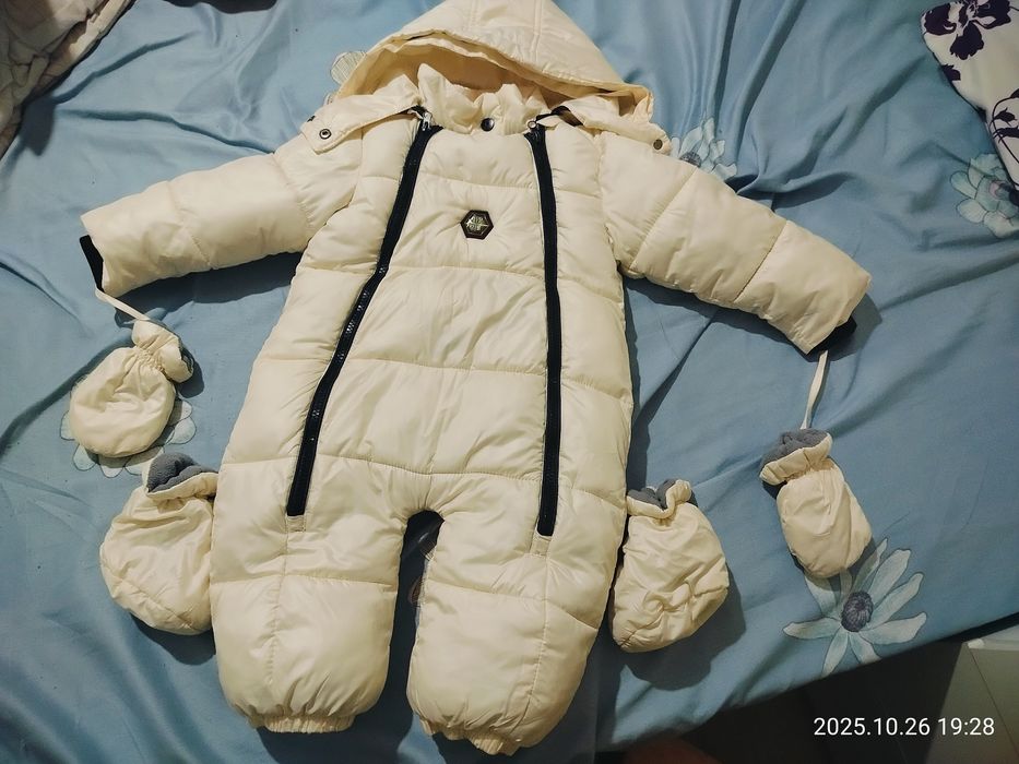 Продам зимний комбинезон детский