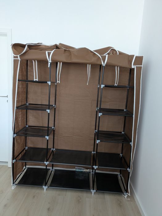 Dulap material textil compartimente și tije