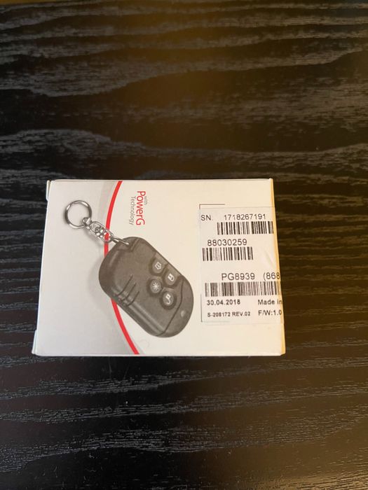 Telecomanda sistem alarma cu 4 butoane DSC seria Neo.