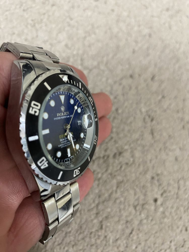 Часовник Rolex.