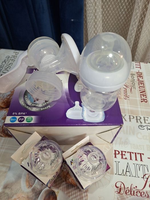 Механический молокоотсос