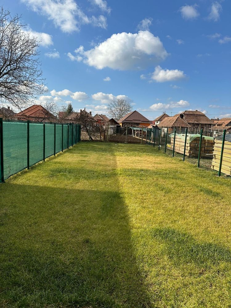 Apartament cu 3 camere la parter + curte