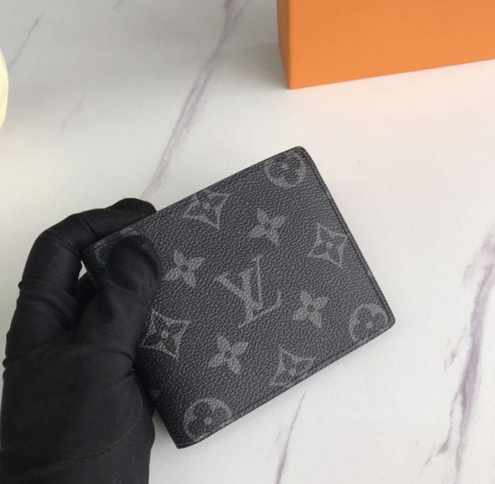 Portofele Louis Vuitton din piele