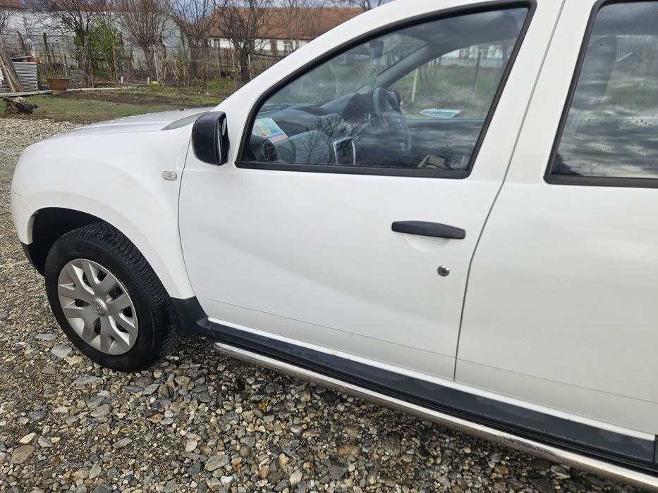 Usa stanga fata Dacia Duster an 2014