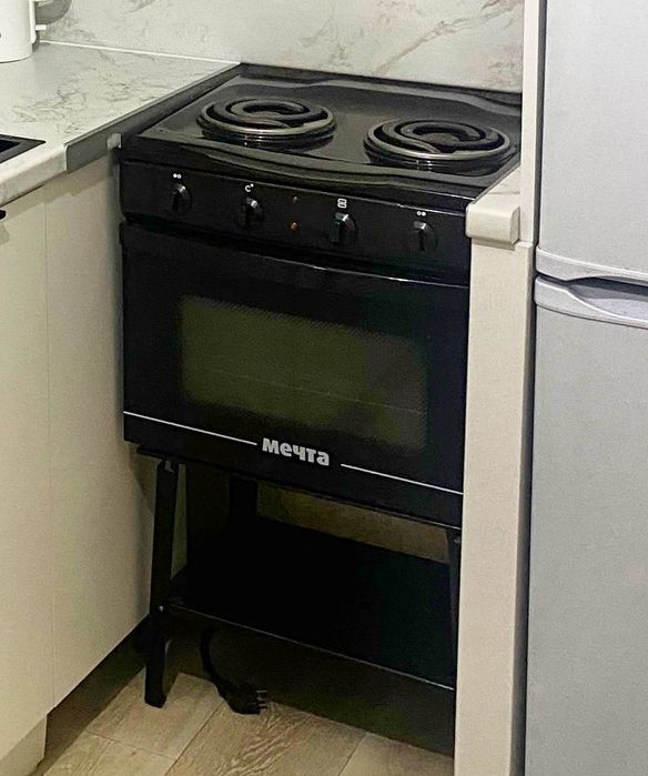 Электроплита с духовкой