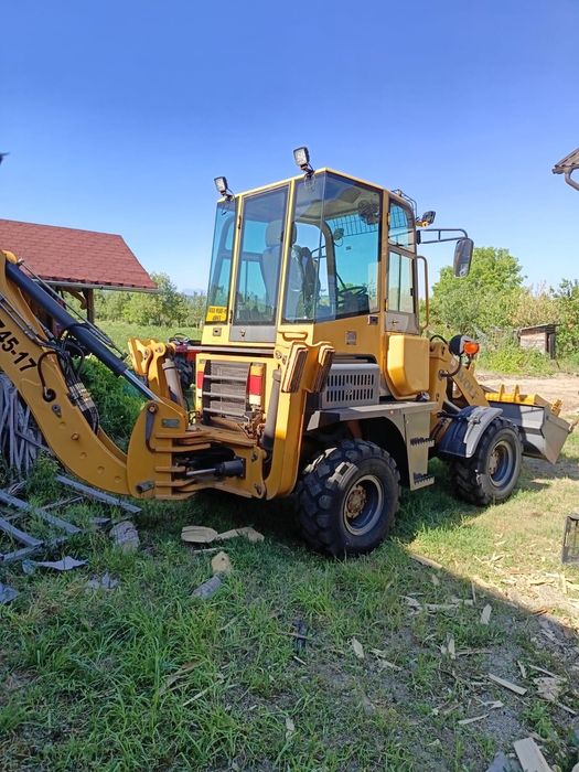 Buldoexcavator WOLF an 2020 cu doar 100 ore