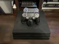 PS4 Pro 1TB + 2 manete si 6 jocuri