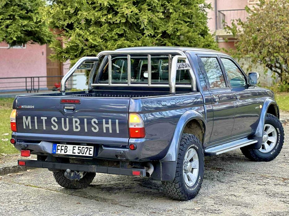 - IMPECABIL Mitsubishi L200 2.5Di-D133cp DAKAR EDITION Full