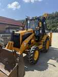 Buldoexcavator Caterpillar 428B 4x4 cu blocanti si 3 cupe