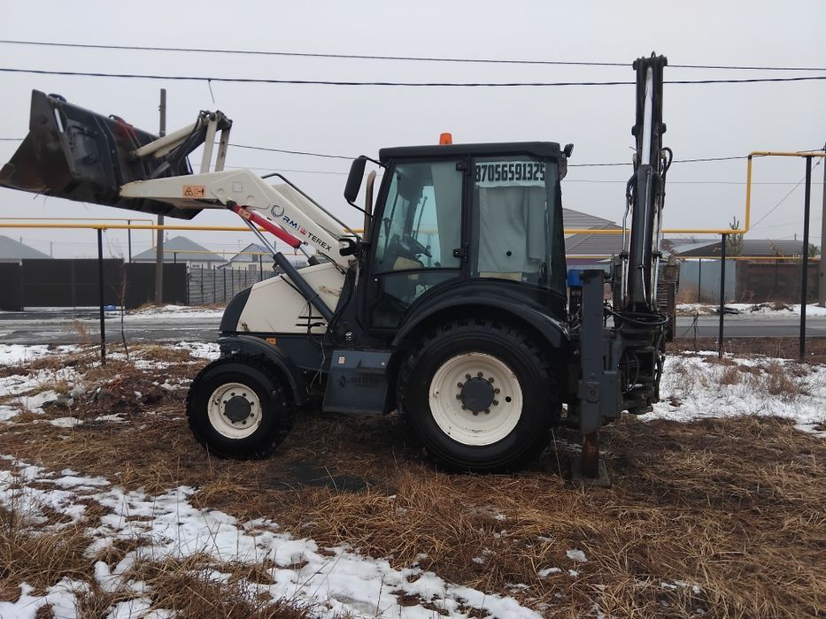 Эксковатор-погрузчик