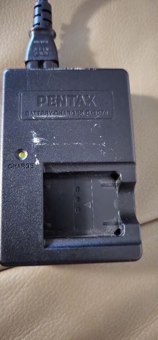Încărcător acumulator foto Canon și Pentax