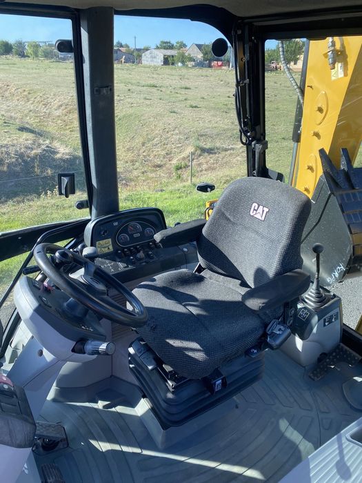 Buldoexcavator Cat 428E