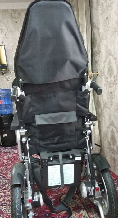 Инвалидная коляска.