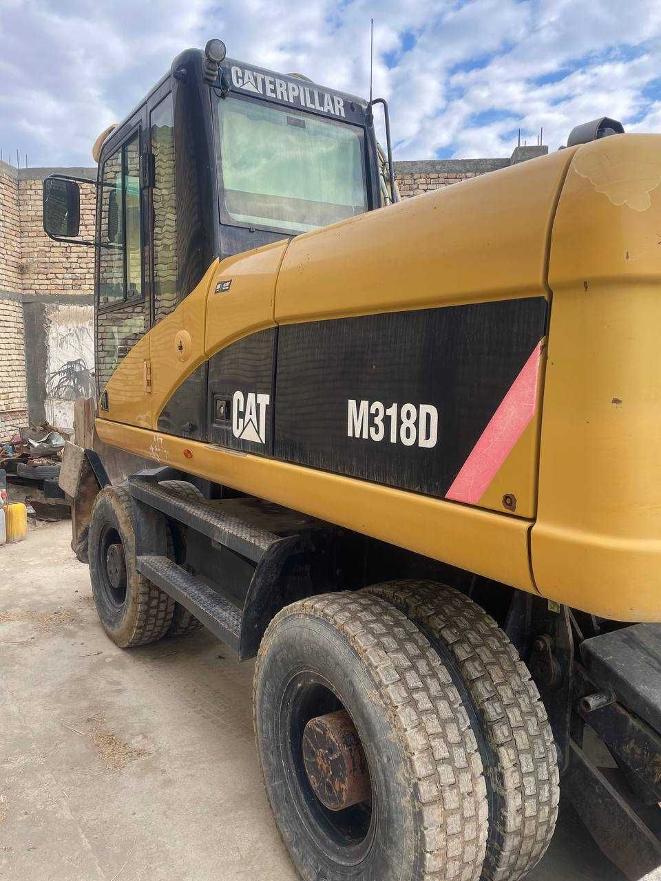 Колесный экскаватор CAT M318D