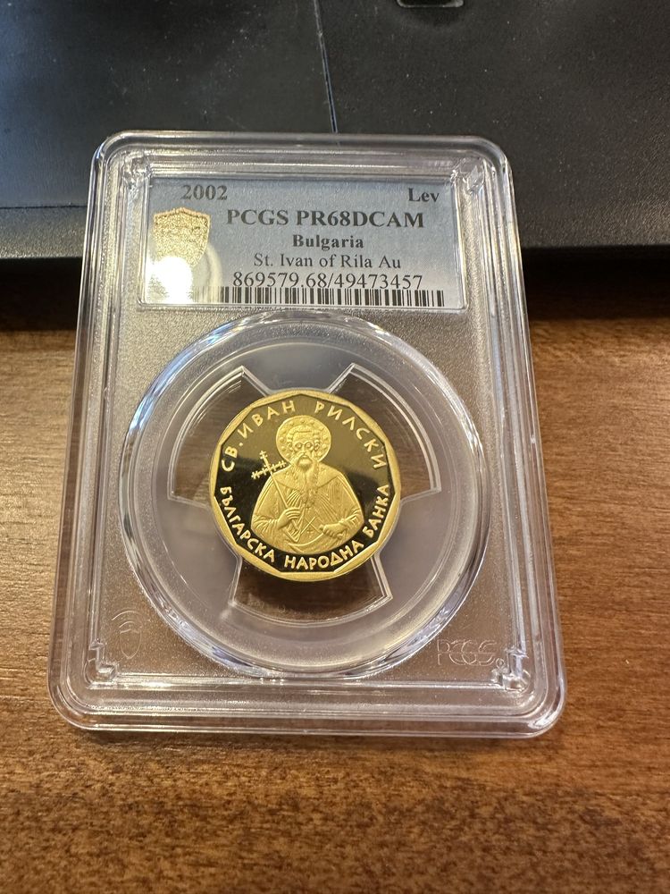 Лев 2002 злато pcgs ngc рядък Иван Рилски грейдван