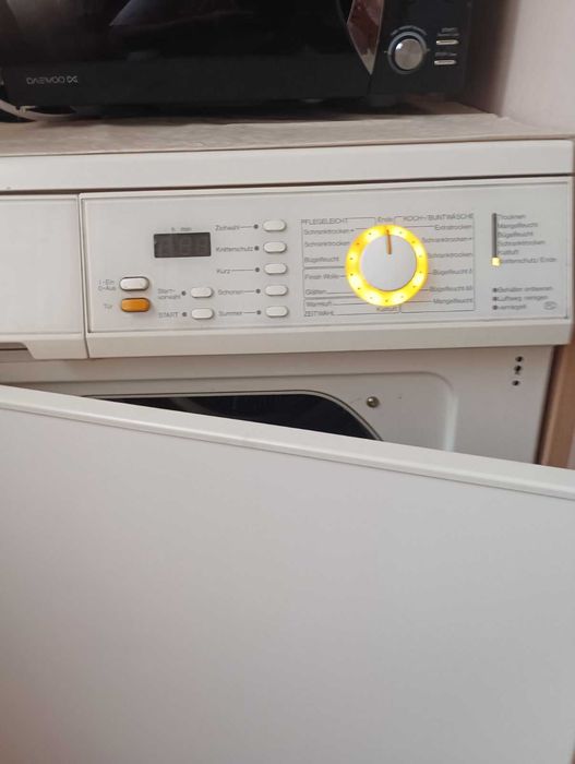 Домакински електроуре -Сушилня Miele