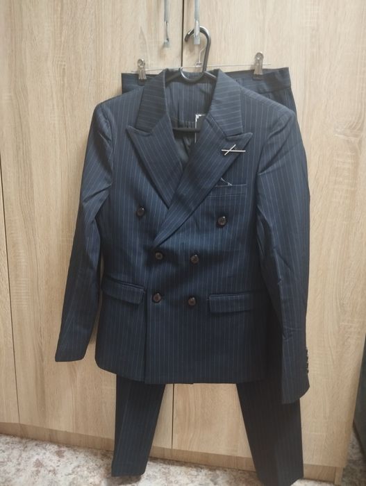 Продам новый костюм мужской