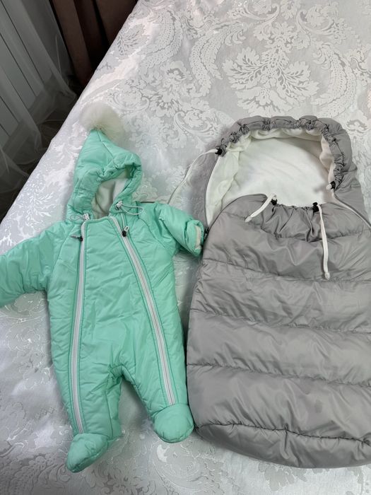 Продам зимний комбинезон с конвертом для новорожденного