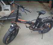 Bicicletă asistat electric
