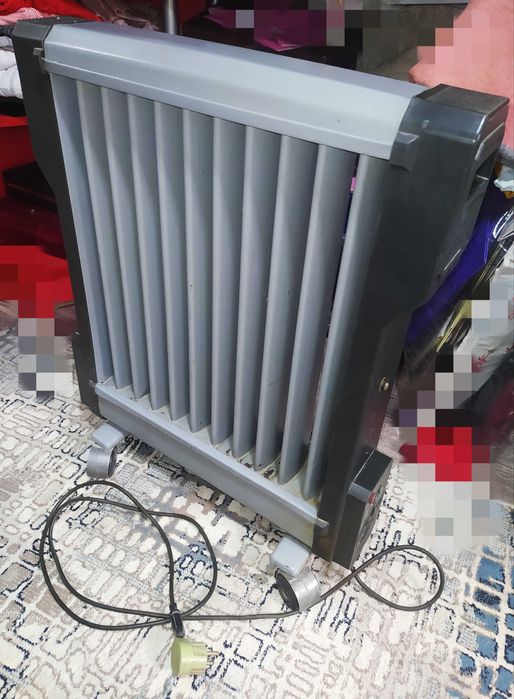 Масляный обогреватель