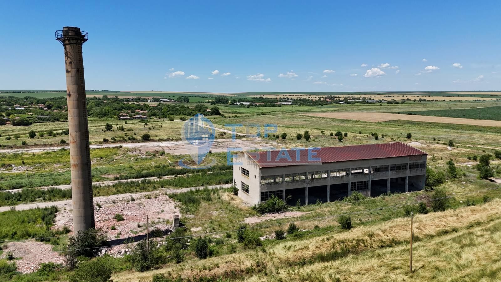 Промишлен имот с 57 дка парцел, промишлени сгради и подстанция в с. О