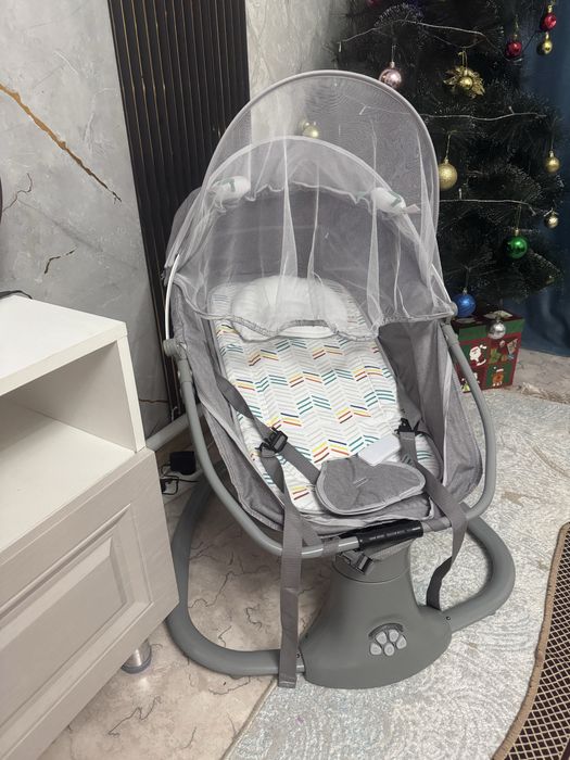 Детская качеля новая музыкальная